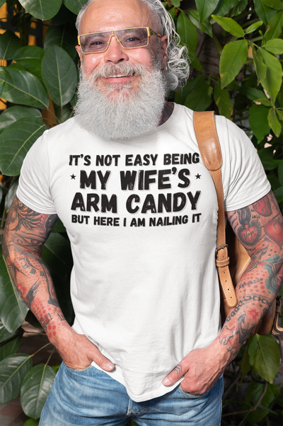 "It's not easy being my wife's arm candy" - T-Shirt (DT)