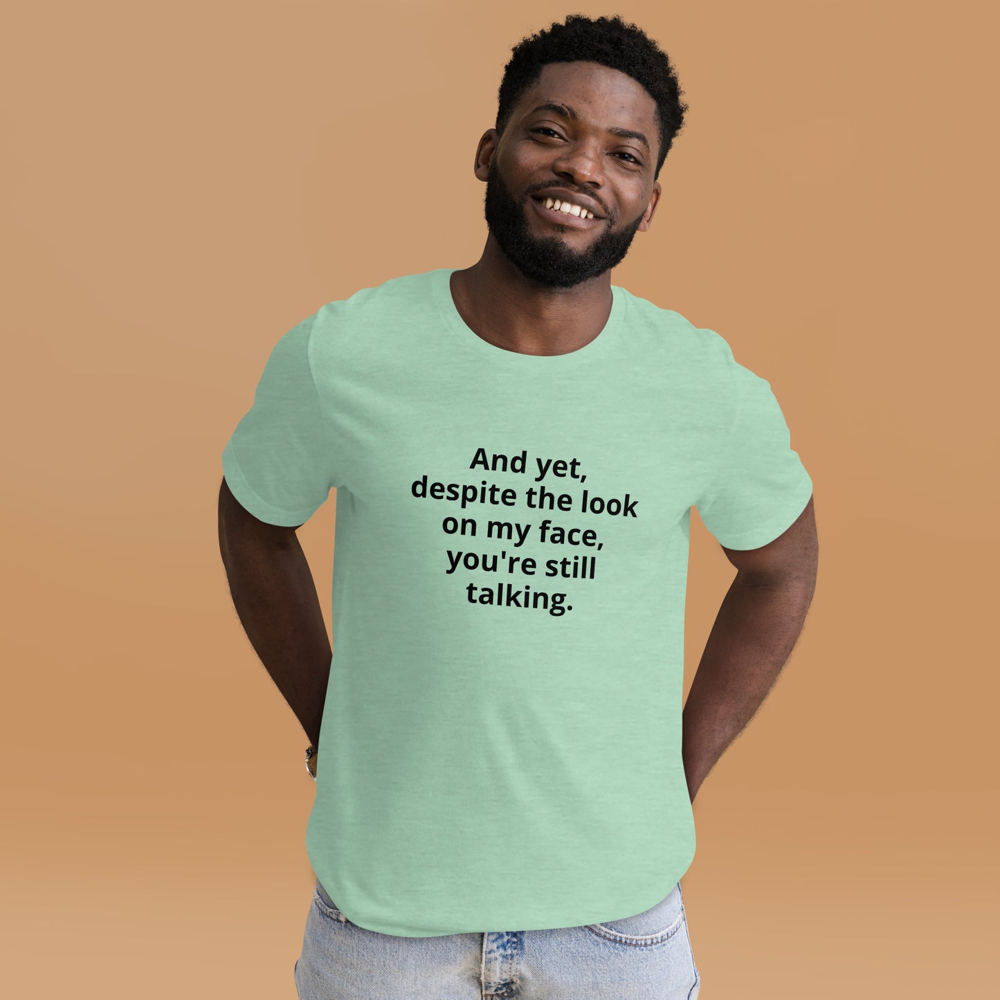 "And yet, despite the look on my face, you're still talking." - T-shirt, unisex (DT)