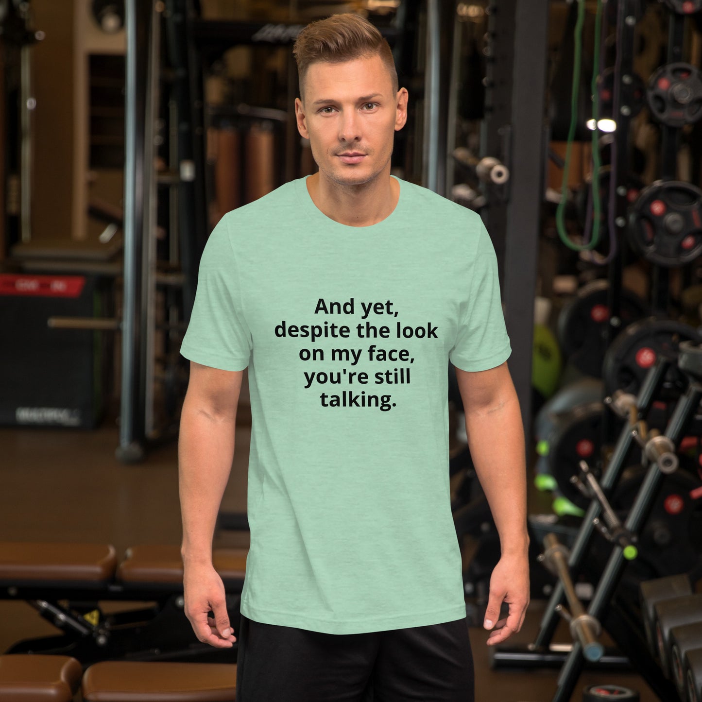 "And yet, despite the look on my face, you're still talking." - T-shirt, unisex (DT)