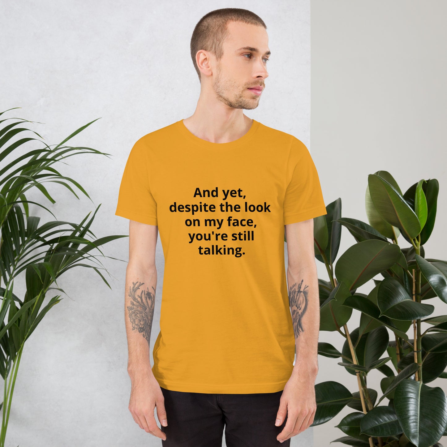 "And yet, despite the look on my face, you're still talking." - T-shirt, unisex (DT)