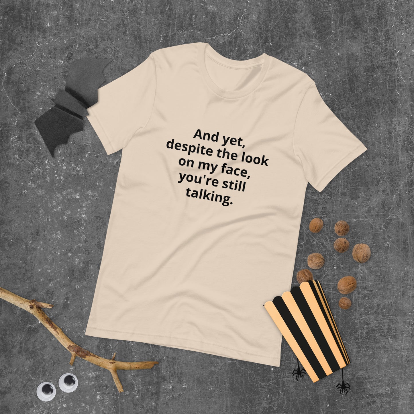 "And yet, despite the look on my face, you're still talking." - T-shirt, unisex (DT)
