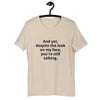 "And yet, despite the look on my face, you're still talking." - T-shirt, unisex (DT)